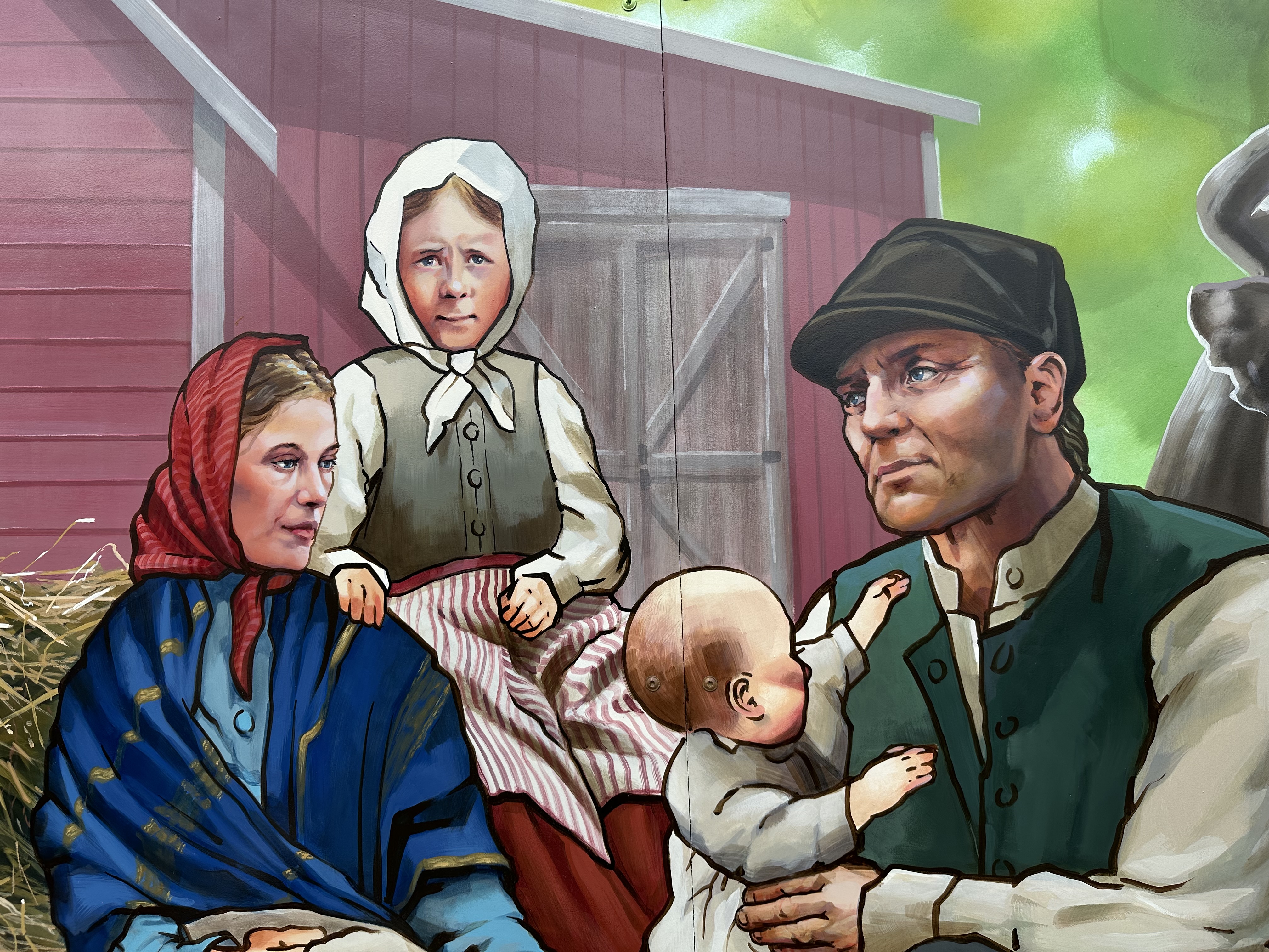 Mural depicting a Swedish immigrant family in 19th-century traditional dress