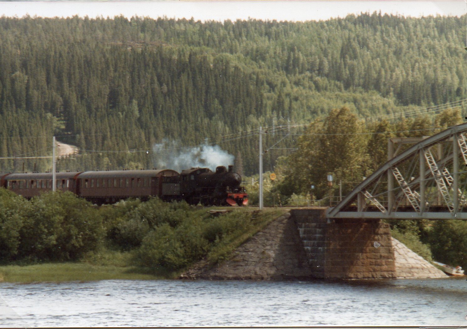 Train crossing a bridge in northern Sweden